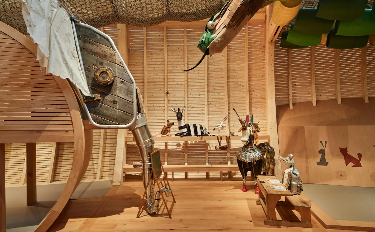 sculptures of elephant, giant snake and unicorn in the exhibition