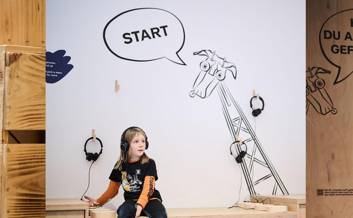 Collage of three images: Child holding a bracelet to a round wooden box with speech bubble, child with headphones listening attentively, and child with headphones standing in front of a screen.
